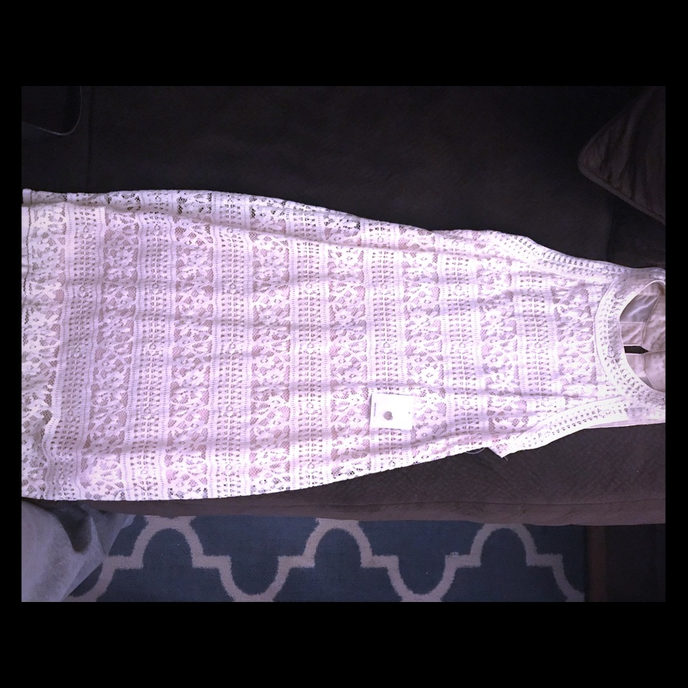 White lace dress with light pink undertone